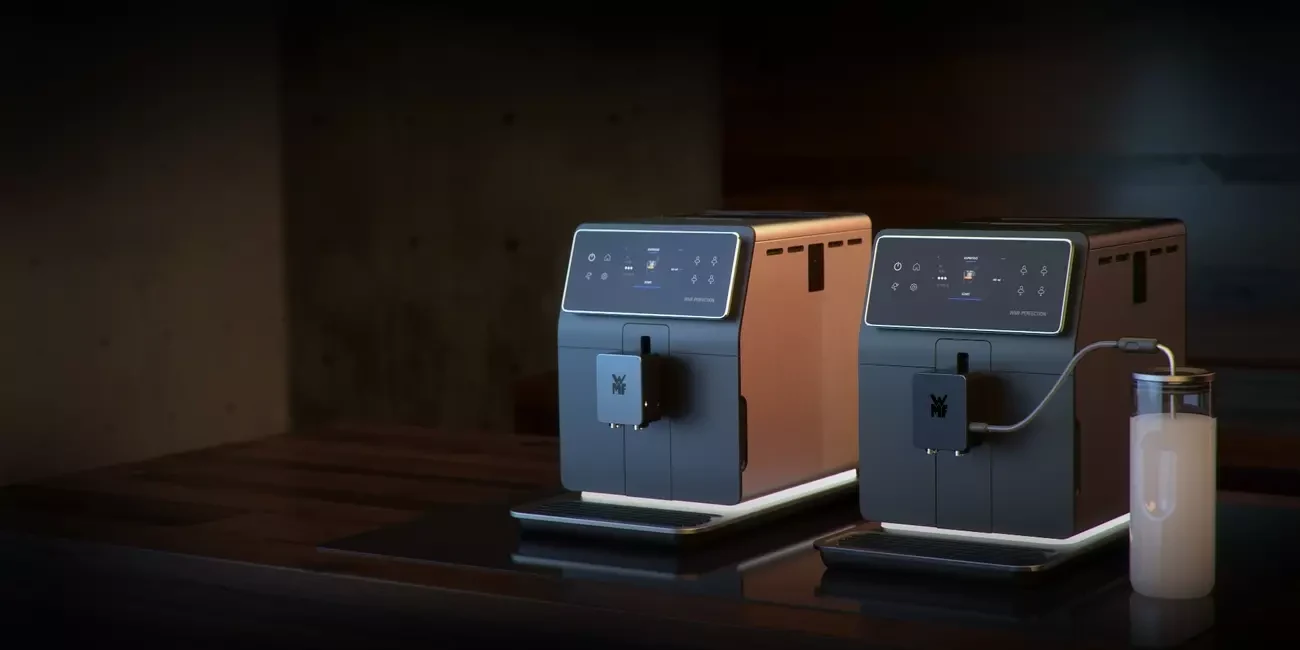 WMF Perfection coffee machines in a warm, dark kitchen setting