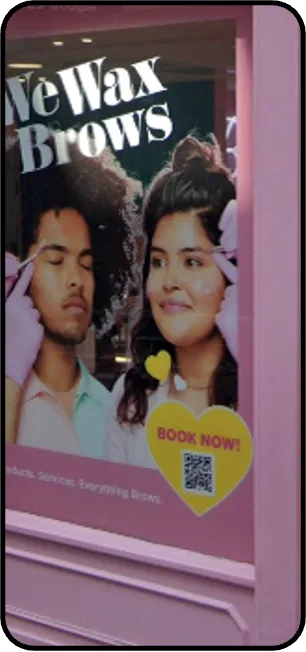 Benefit Cosmetics New Wax Brows display with a book-now QR code